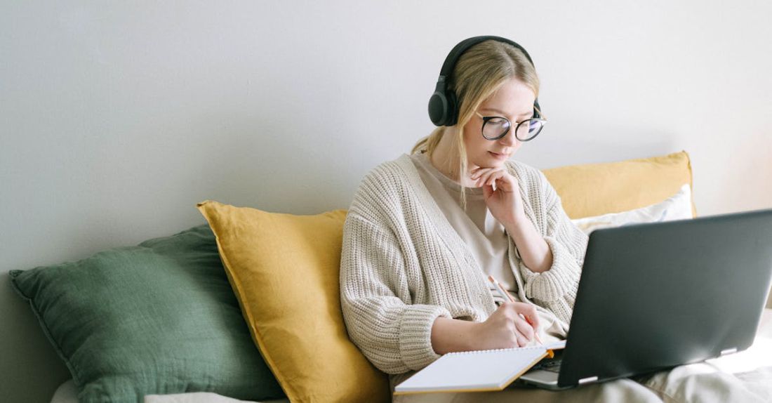 Digital Nomadism - Photo of Woman Taking Notes