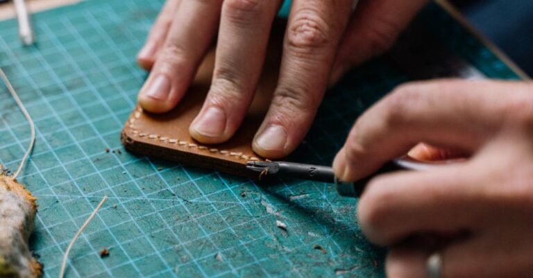 Tools - Person Holding Brown Leather Material