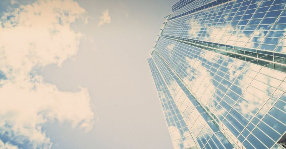 Companies - White and Blue Building during Daytime